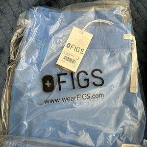 BRAND NEW.. NEVER WORN, OPENED 1 shirt to look at.. FIGS SCRUBS